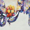 Two Elephants Holding Flowers With Their Noses