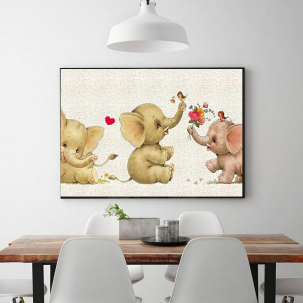 Three Cute Little Elephants Play Happily