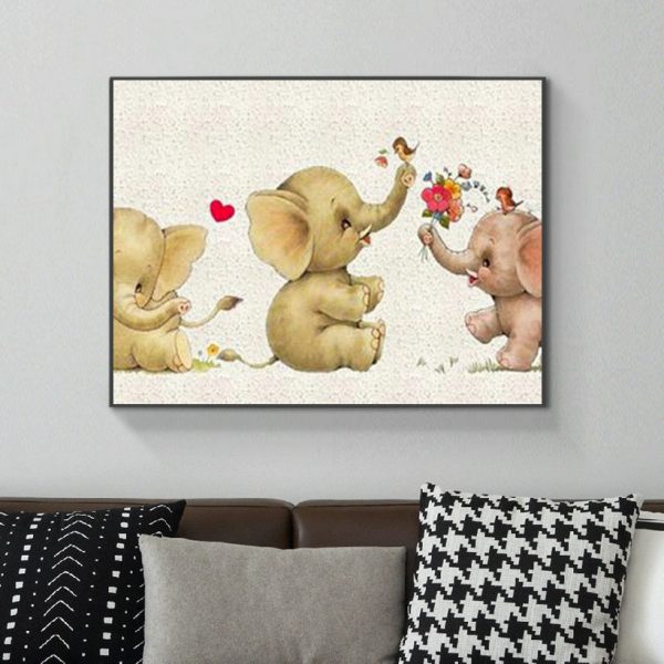 Three Cute Little Elephants Play Happily