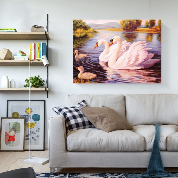 Happy Swan Family Swimming On The Water