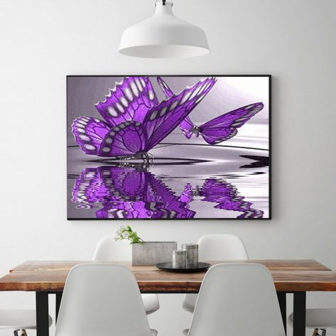 Two Purple Flower Butterflies Playing On The Water